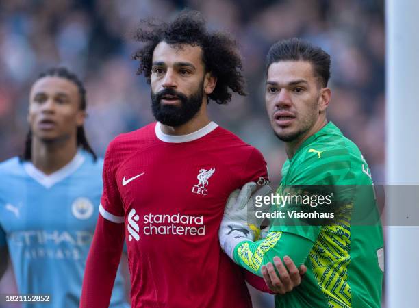Mohamed Salah of Liverpool and Manchester City goalkeeper Ederson during the Premier League match between Manchester City and Liverpool FC at Etihad...