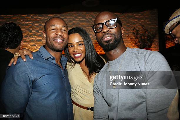 Tank, Claudette Ortiz, and Bryan-Michael Cox visit the Moet Executive Lounge at STK Atlanta on September 27, 2013 in Atlanta, Georgia.