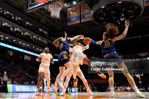 Natalija Marshall of the Notre Dame Fighting Irish and Anna DeWolfe block a layup attempt by Jasmine Powell of the Tennessee Lady Vols in the third...