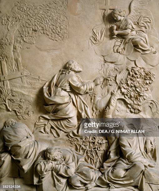 Christ in the garden of Gethsemane, by Carlo Liberali, terracotta relief, Italy.