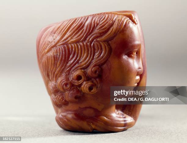 Face in profile in amber uncovered in 1982 in a tomb in Nijmegen, The Netherlands. Roman Civilisation, 1st century. Nimega, Rijksmuseum Gm Kam