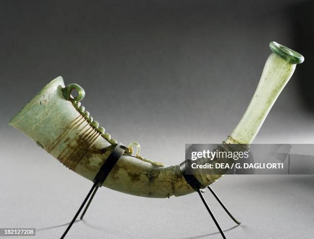 Glass rhyton in the shape of a horn uncovered in a sarcophagus from the 2nd-3rd century. Roman Civilisation, 2nd century. Nimega, Rijksmuseum Gm Kam