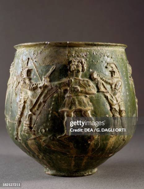 Ceramic container with enamel-painted depiction of two gladiators and a referee, found in Nijmegen, The Netherlands. Roman Civilisation, 2nd century....