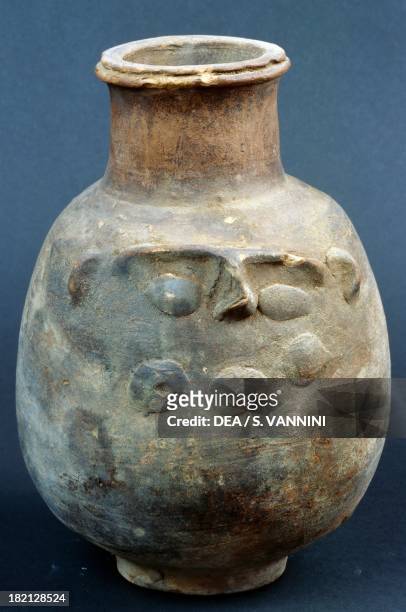Terracotta vase depicting the God Bes, Valley of the Golden Mummies, Bahariya Oasis, Giza, Egypt. Egyptian Civilisation, 1st century AD.