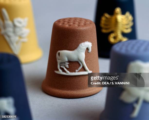 Variously colored decorative thimbles, detail, ceramic, Wedgwood manufacture, Stoke-on-Trent, England, 20th century.