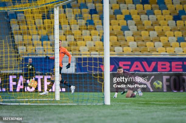 In Lviv, Ukraine, on December 3 Denys Sydorenko, the goalkeeper of FC Metalist 1925 Kharkiv, is focusing on the ball during the 16th Round game of...