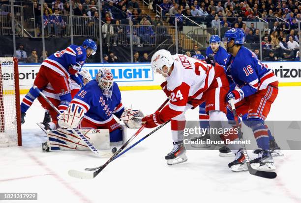 Igor Shesterkin of the New York Rangers makes the first period save against Klim Kostin of the Detroit Red Wings at Madison Square Garden on November...