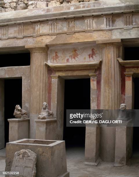 View of Tomb 2, with the entrance surrounded by the painted door frame, small statues of sphinxes and the central sacrifical altar, Necropolis of...