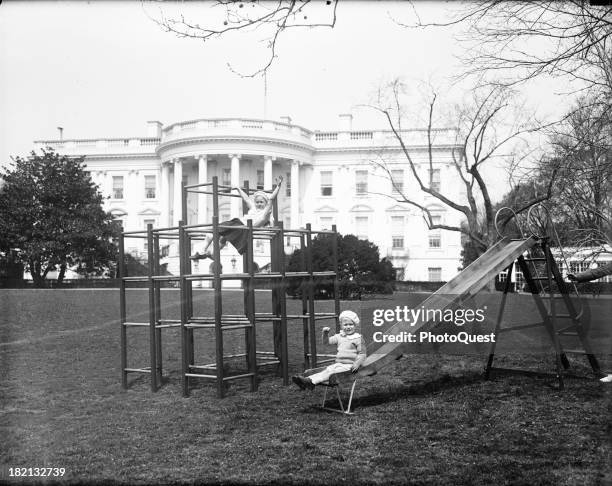 The grandchildren of US President Roosevelt play on the south lawn of the White House, Washington DC, 1933. The children of Mr and Mrs Curtis Dall,...