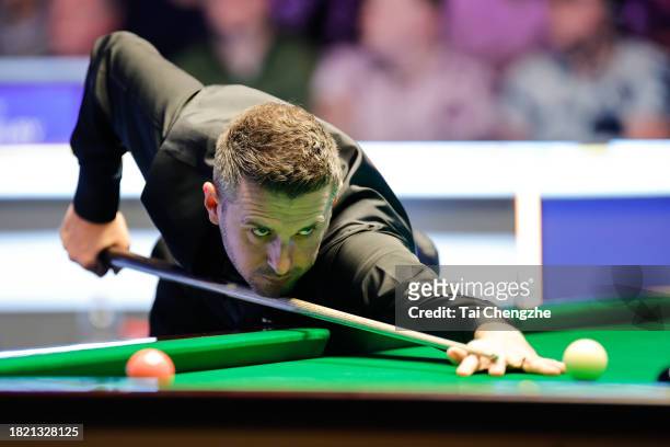 Mark Selby of England plays a shot in the second round match against Barry Hawkins of England on day 5 of the 2023 MrQ UK Championship at Barbican...
