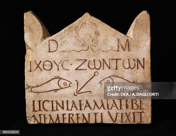 Christian stele of Licinian Amias: anchor and fish representing the faithful going towards salvation, Greek words the Fish of the living meaning...