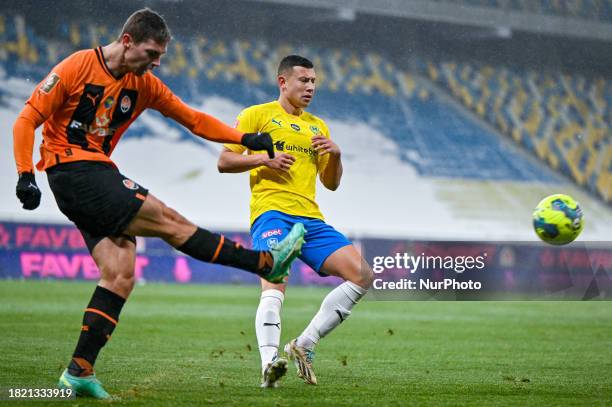 In Lviv, Ukraine, on December 3 forward Andrii Boriachuk of FC Metalist 1925 Kharkiv is in action with a player of FC Shakhtar Donetsk during the...