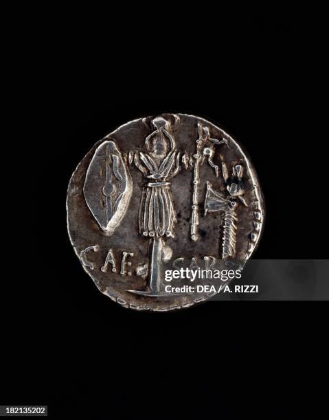 Denarius issued by Julius Caesar in Gaul depicting Gallic weapons, verso. Roman coins, 1st century BC.