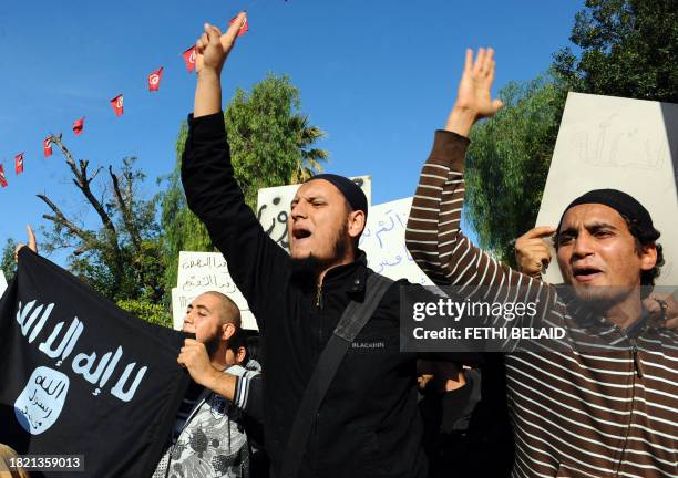 Tunisian salafists shout slogans during a demonstration in front of the assembly on December 3, 2011 in Tunis. Thousands of Islamist supporters...