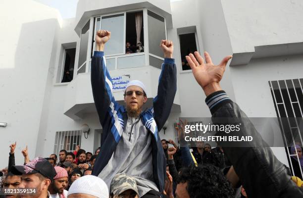 Group of Tunisian Salafists shouts on November 29, 2011 outside the building housing the office of the dean of the Faculty of Arts at the University...