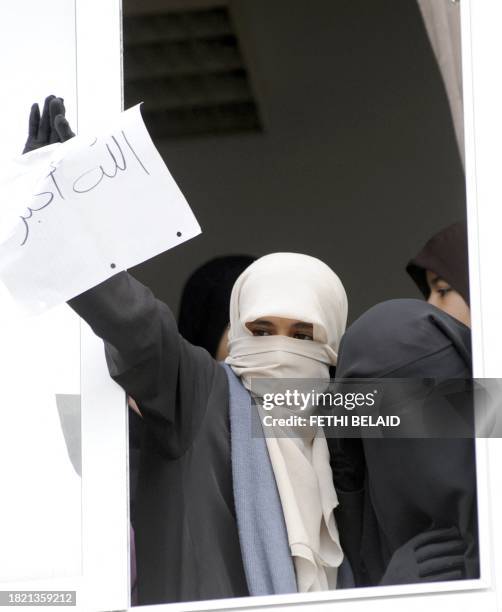 Group of Tunisian Salafists shouts slogans on November 29, 2011 inside the building housing the office of the dean of the Faculty of Arts at the...