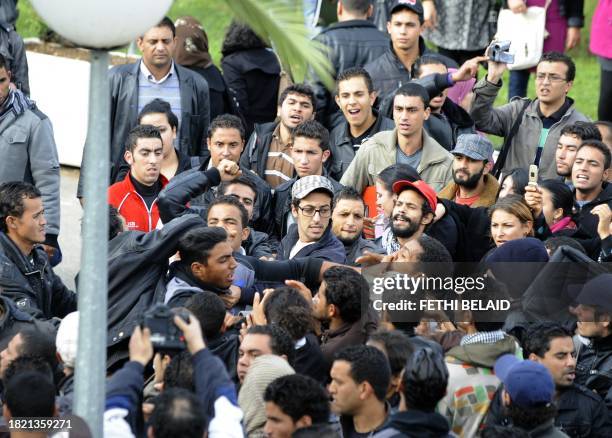 Group of Tunisian Salafists clashes with students on November 29, 2011 at the University of Manuba, 25 kms west of Tunis. Several hundred people...