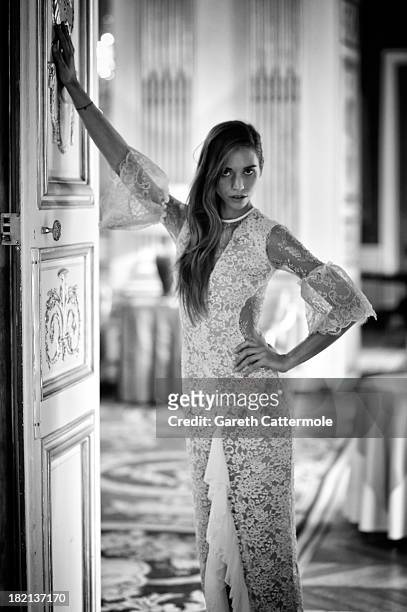 Model poses during the Alessandra Rich presentation at the British Ambassador's residence as part of Paris Fashion Week Womenswear Spring/Summer 2014...
