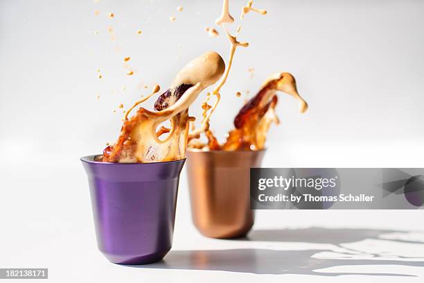 repetitive & splash - coffee splash stockfoto's en -beelden