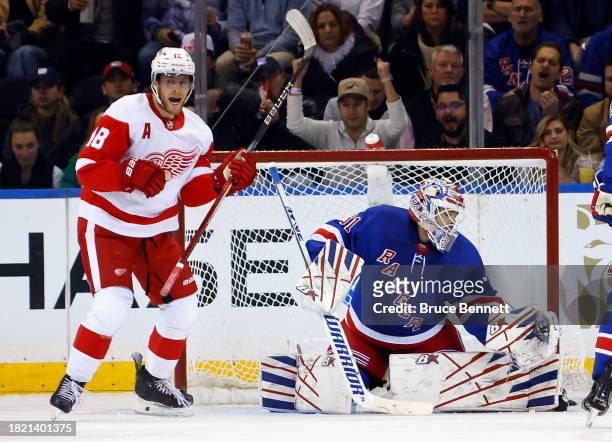 Andrew Copp of the Detroit Red Wings celebrates a second period goal by Moritz Seider against Igor Shesterkin of the New York Rangers at Madison...