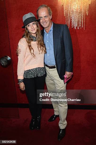 Xavier Romatet and his daughter Alix attend the Jean Paul Gaultier show as part of the Paris Fashion Week Womenswear Spring/Summer 2014 on September...