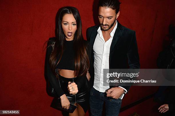 Nabilla Benattia and Thomas Vergara attend the Jean Paul Gaultier show as part of the Paris Fashion Week Womenswear Spring/Summer 2014 on September...