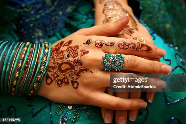 henna - gold embroidery stock pictures, royalty-free photos & images