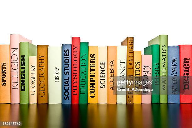 row of books - book spine stock pictures, royalty-free photos & images