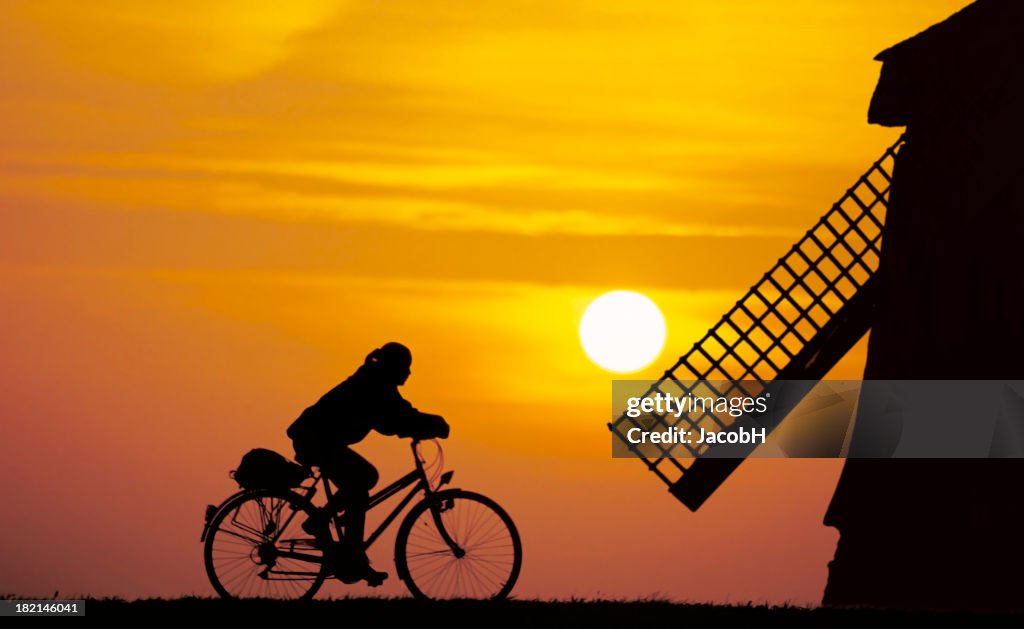 Girl on a bike in Dutch Setting