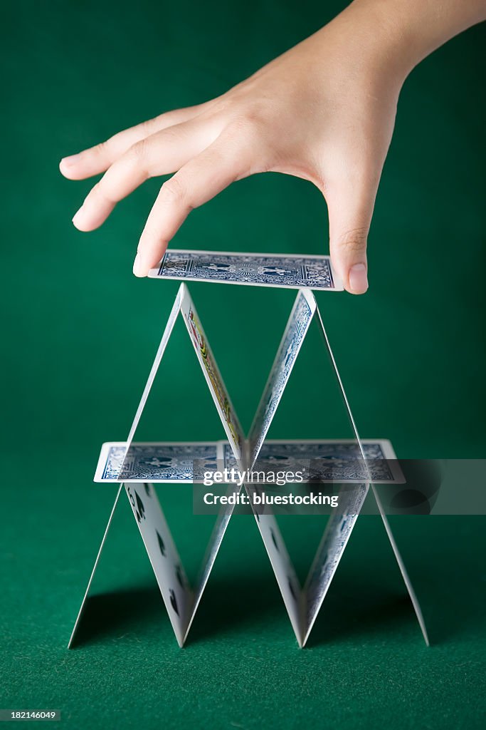 Two-layer solitaire tower in green background