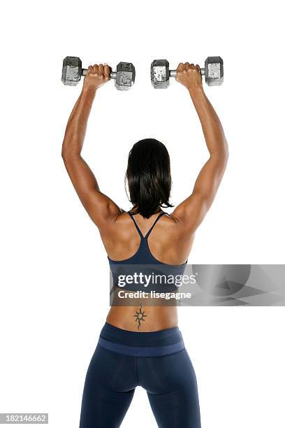 woman with weights, back view - atlete stockfoto's en -beelden