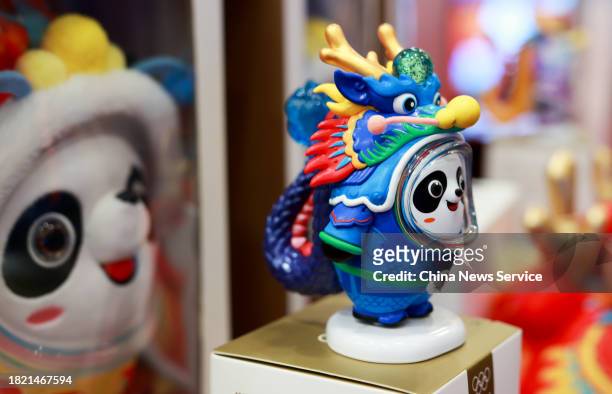 Chinese zodiac dragon version of Beijing Winter Olympic Games mascot Bing Dwen Dwen makes appearance at China's National Stadium on November 29, 2023...