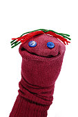 Handmade red sock puppet.