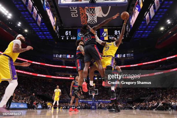 LeBron James of the Los Angeles Lakers drives to the basket against Isaiah Stewart of the Detroit Pistons during the second half at Little Caesars...