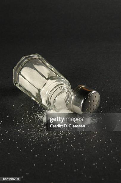 spilled salt - sodium stock pictures, royalty-free photos & images