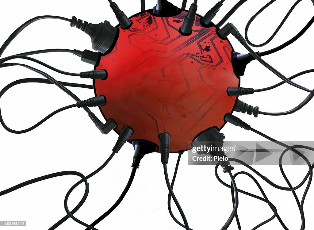 Power cords plugged into red sphere battery