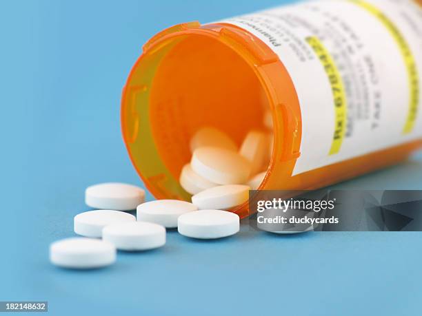 prescription drug bottles - prescription label stock pictures, royalty-free photos & images