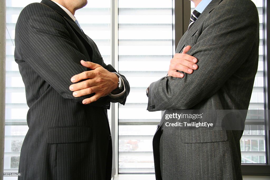 Confrontation of two businessman