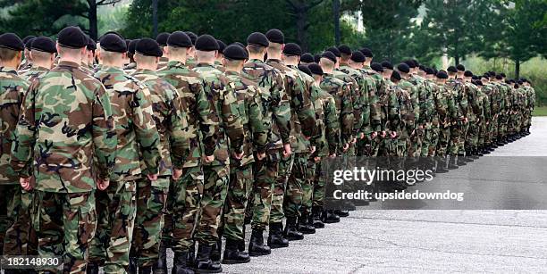 army soldiers standing in a straight line - zeemacht stockfoto's en -beelden