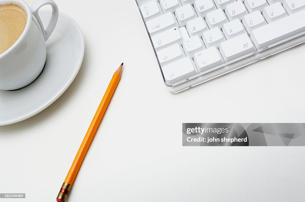 Business Office scenario, keyboard, pencil and coffee