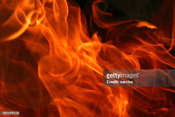 image of fire on black background - flame background stock pictures, royalty-free photos & images
