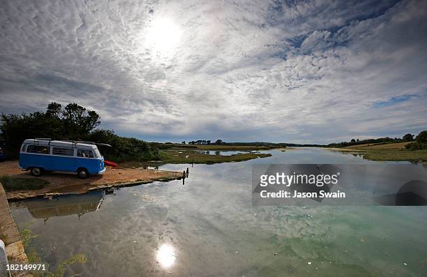 Big sky, a camper van, a kayak and a lazy river. Taken at Newtown creek on the Isle of Wight.