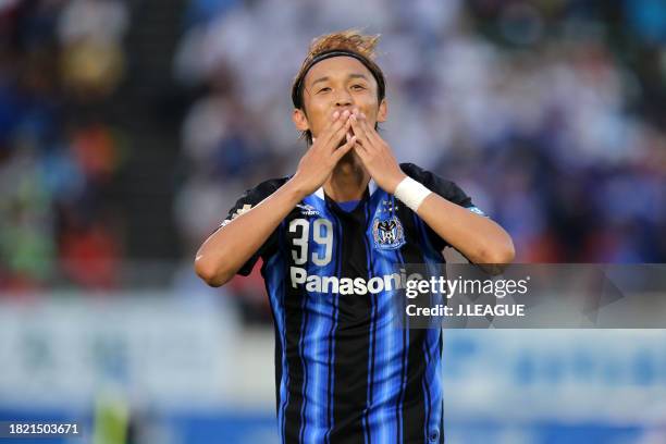 Takashi Usami of Gamba Osaka celebrates after scoring his team's third goal during the J.League J1 second stage match between Gamba Osaka and Kashiwa...