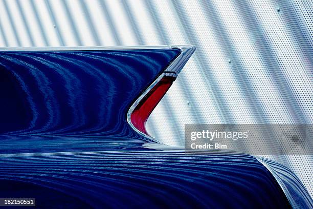 classic car tail fin against corrugated iron metal wall - an american tail stock pictures, royalty-free photos & images