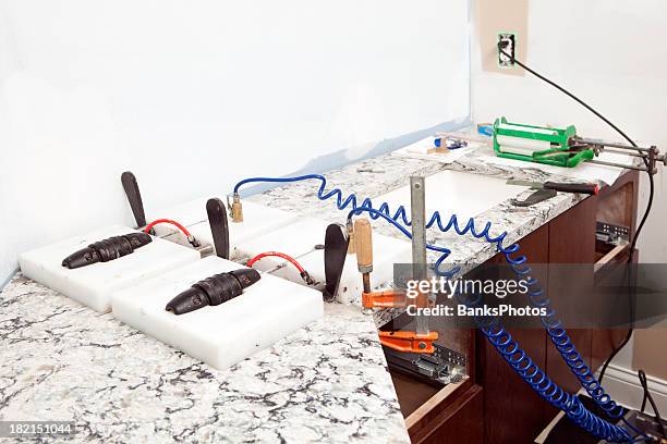 solid surface countertop installation equipment - bathroom counter stock pictures, royalty-free photos & images