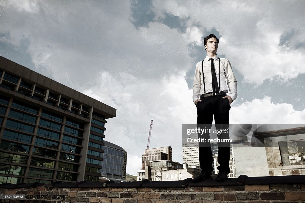 Young Man on City Rooftop