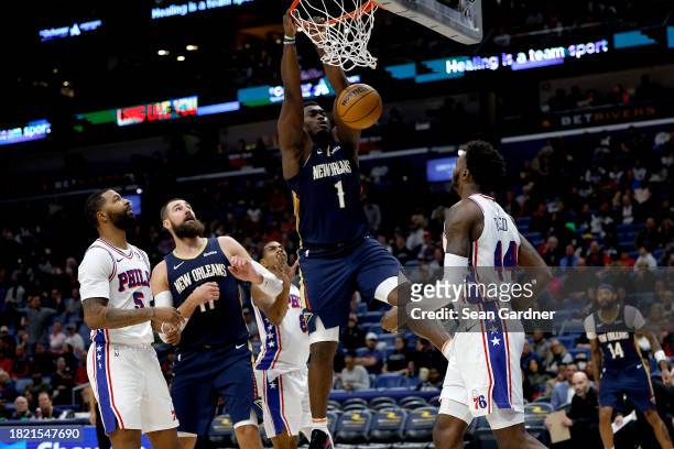 Zion Williamson of the New Orleans Pelicans dunks the ball during the third quarter of an NBA game against the Philadelphia 76ers at Smoothie King...