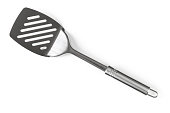 A silver spatula angled diagonally 