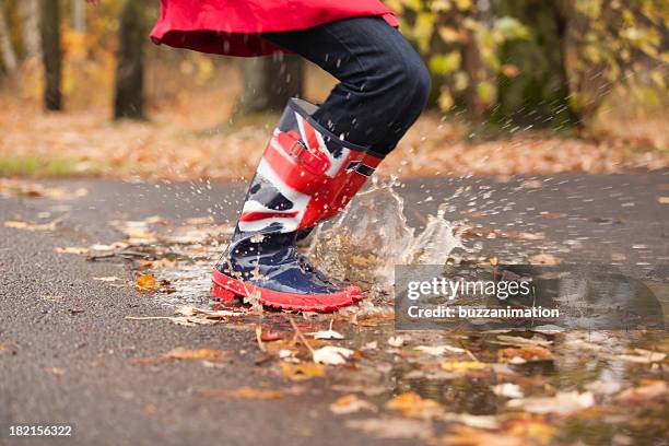 jump into a water puddle - grunge union jack stock pictures, royalty-free photos & images
