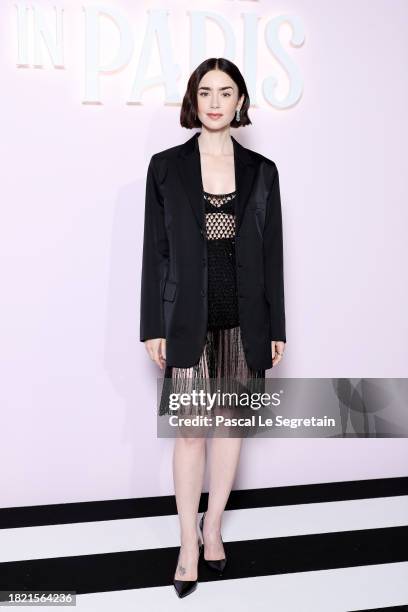 Lily Collins attends the "Emily In Paris" Netflix Photocall at La Samaritaine on September 12, 2024 in Paris, France.